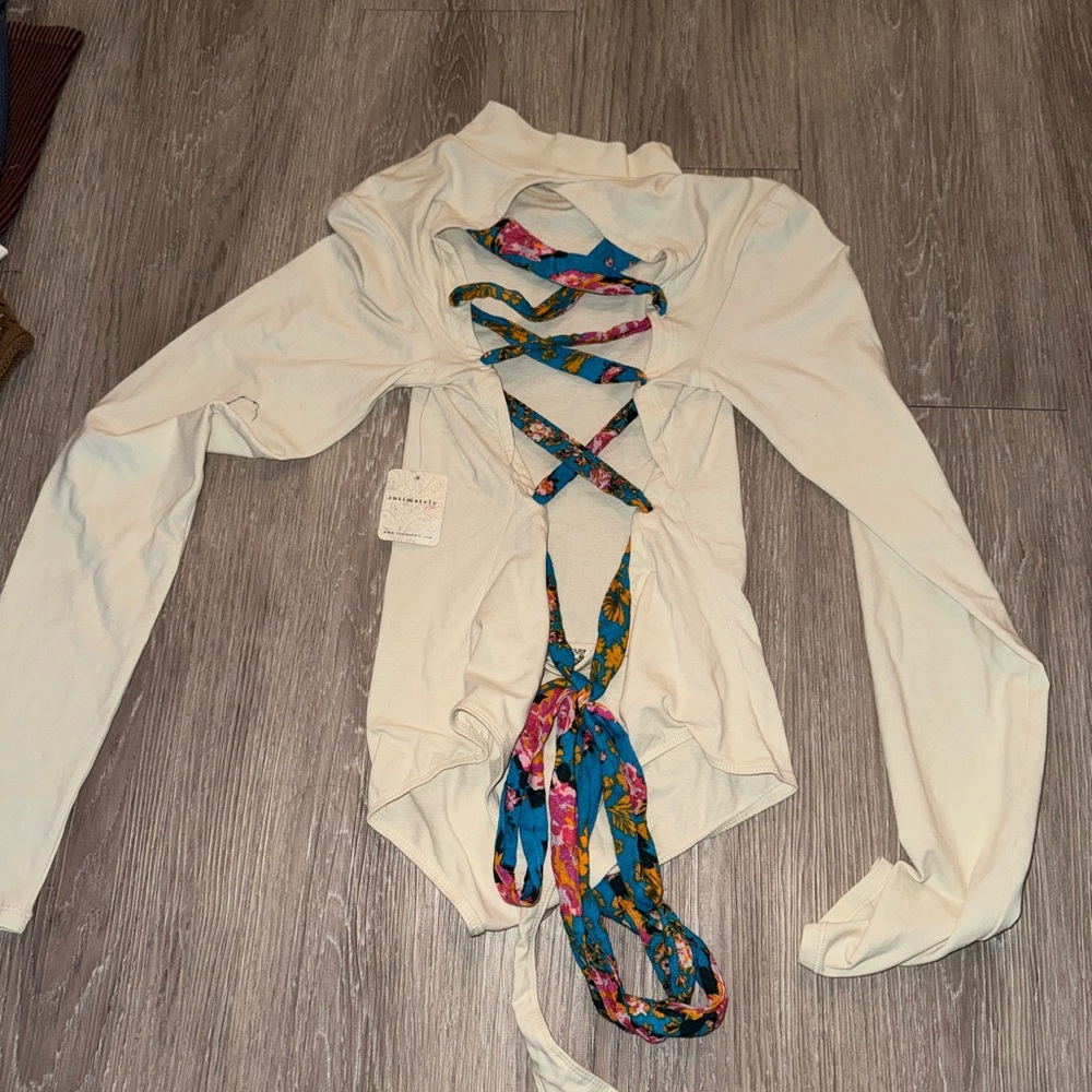 Long sleeve body suit going out shirt cross back